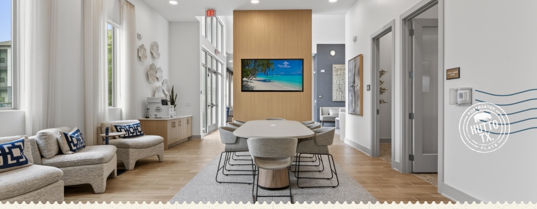 a co-working lounge  with a tv